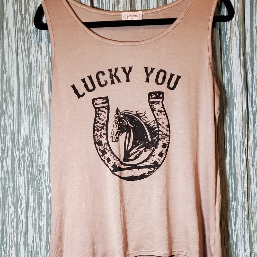 GEMSTONE

  A-Symetrical Sleeveless Top